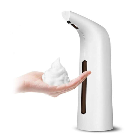 White automatic liquid dispenser dispensing foamy soap into a hand, promoting hygiene and efficiency.