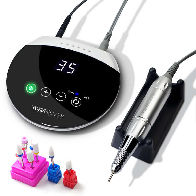 High-quality nail drill machine with sleek aluminum body, featuring various drill bits and digital display for precise nail care.