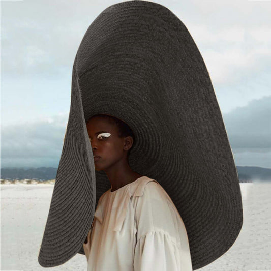 Stylish Ladies Straw Sun Hat showcased on a model, perfect for summer adventures and outdoor activities.