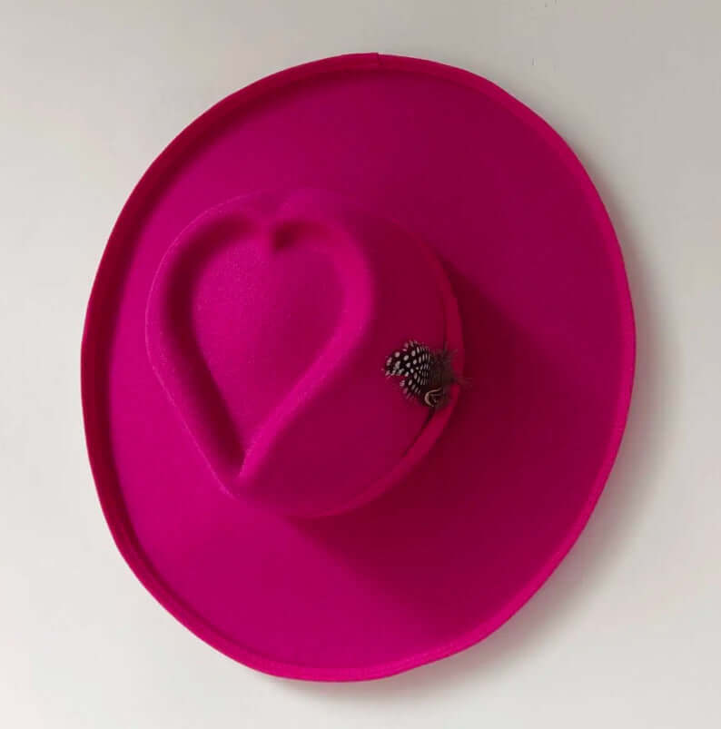 Bright pink Heart Hat with heart-shaped design, made from woolen fabric. Perfect for warmth and style, suitable for medium size (56-58 cm).