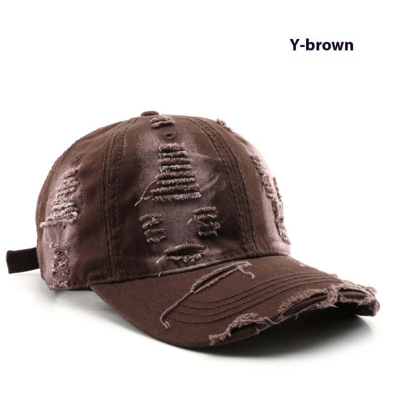 Brown Worn Out Cap with distressed design, perfect for adding a casual, stylish touch to any outfit. Comfortable and trendy accessory.