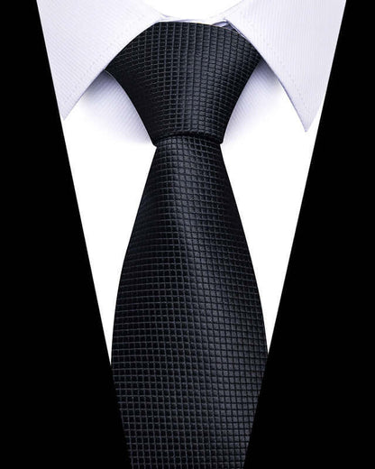 Business Professional Tie in black, enhancing a white-collar shirt with elegance and sophistication for business meetings.