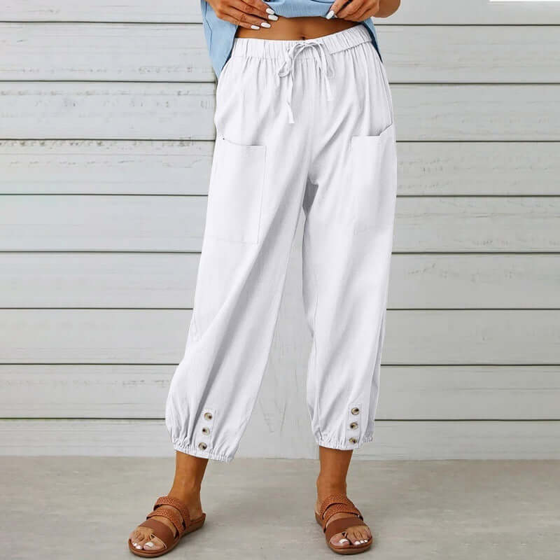 Casual white ladies linen trousers with drawstring waist, showcasing breathable comfort and style for everyday wear.