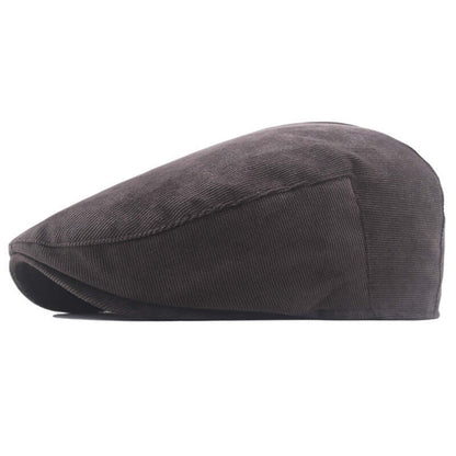 Classic Peaky Blinder Cap in dark fabric, showcasing timeless elegance and modern practicality for sophisticated style enthusiasts.