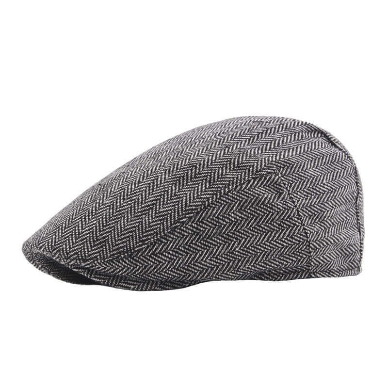 Classic Peaky Blinder Cap in herringbone pattern, perfect for timeless style and modern elegance. Elevate your fashion effortlessly.
