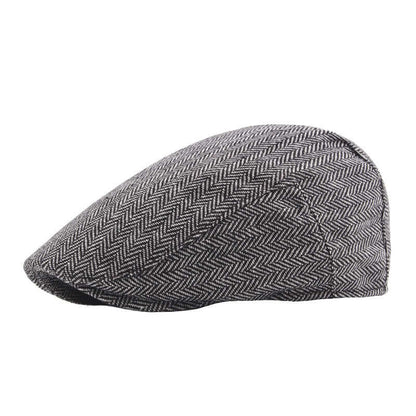 Classic Peaky Blinder Cap in herringbone pattern, perfect for timeless style and modern elegance. Elevate your fashion effortlessly.