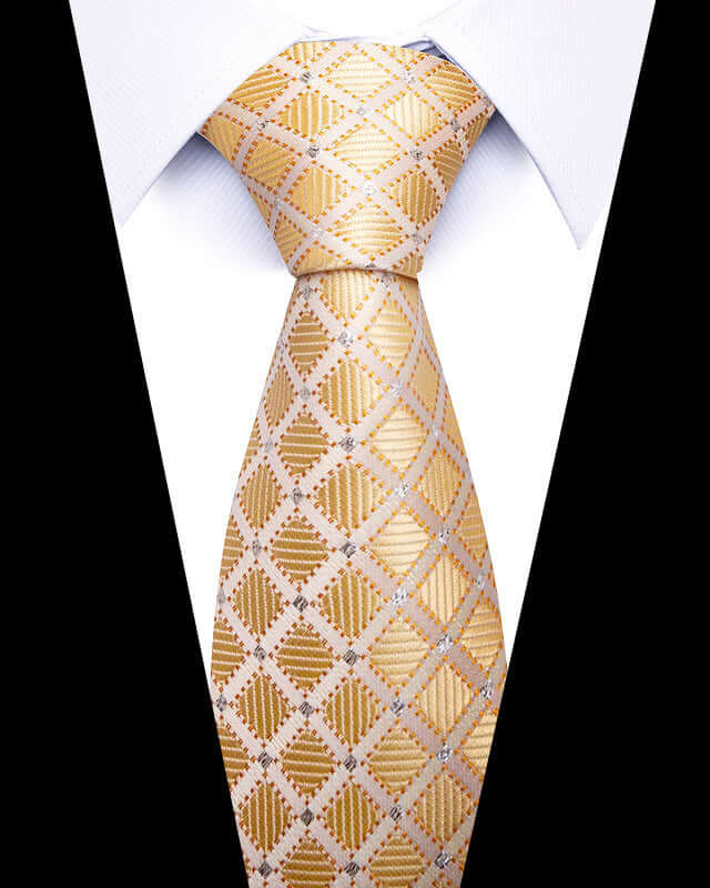 Close-up of gold patterned Business Professional Tie paired with a white shirt, perfect for elevating business attire.