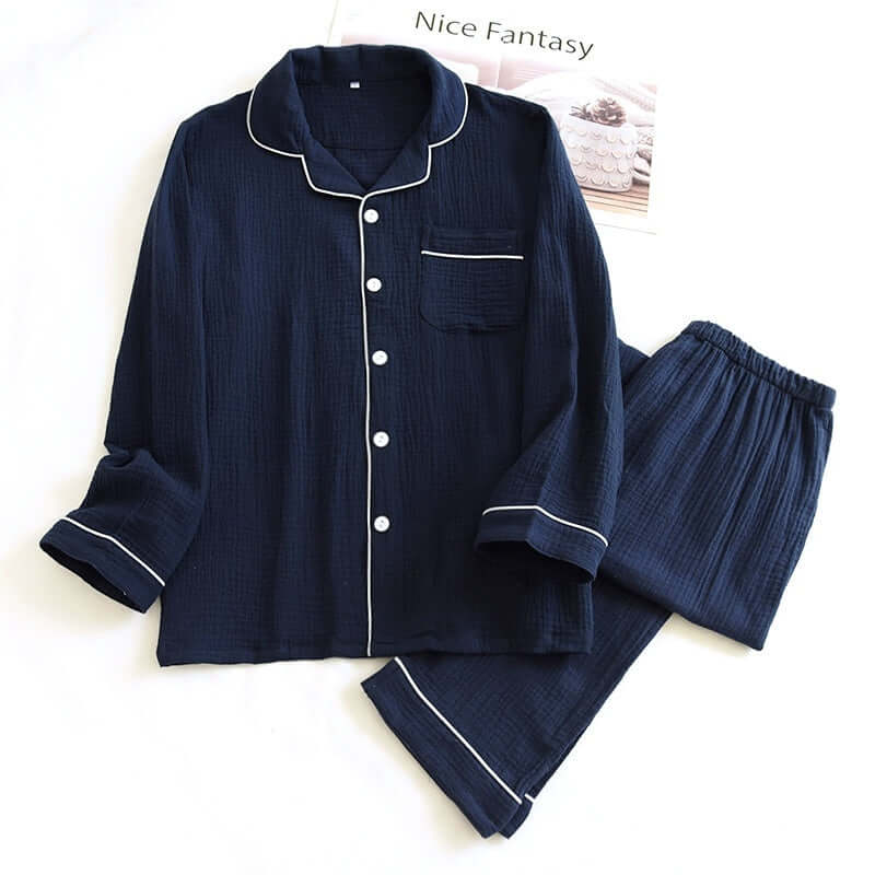 Dark blue male pajama set made from comfortable double-layer gauze fabric, ideal for spring and autumn wear.