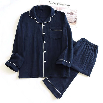 Dark blue male pajama set made from comfortable double-layer gauze fabric, ideal for spring and autumn wear.