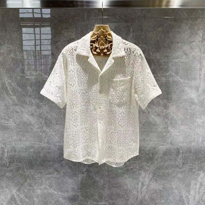 Elegant Italian Style Shirt in white lace design showcased on a hanger against a marble background.