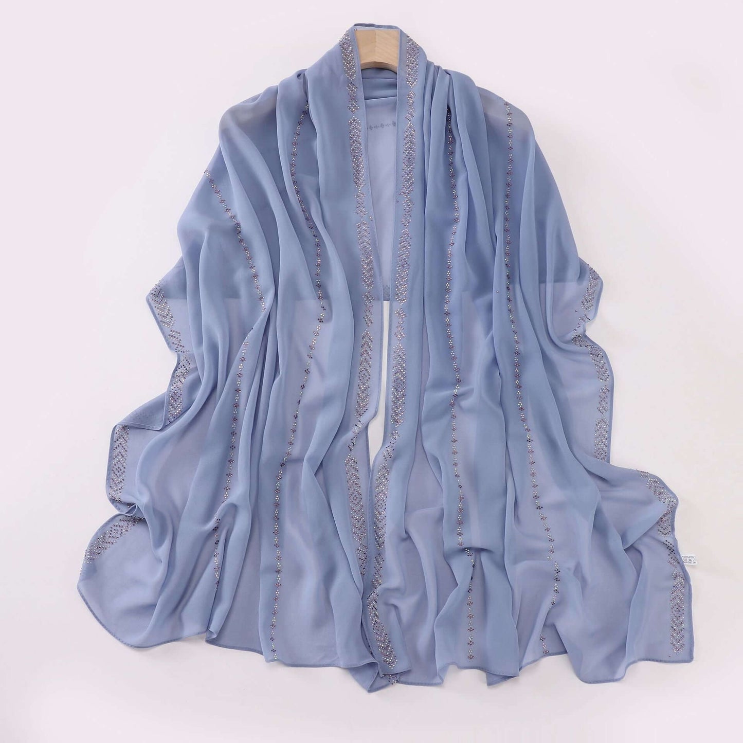 Elegant Ladies Chiffon Scarf in soft blue, versatile 175x70 cm wrap, crafted from airy chiffon for stylish layering options.
