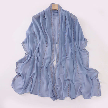 Elegant Ladies Chiffon Scarf in soft blue, versatile 175x70 cm wrap, crafted from airy chiffon for stylish layering options.