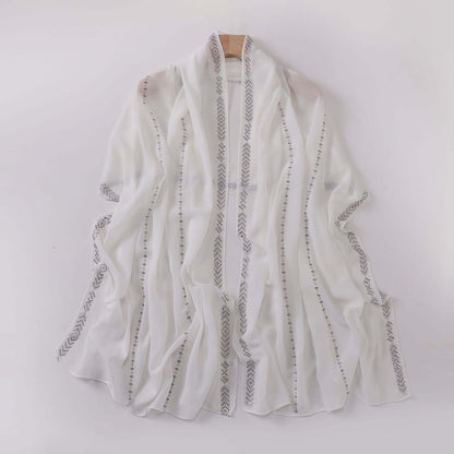 Elegant Ladies Chiffon Scarf in white with delicate patterns, 175 x 70 cm, offering versatile styling and high-quality comfort.