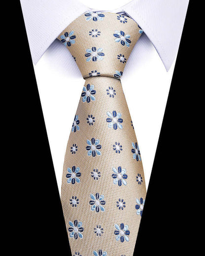 Elegant beige Business Professional Tie with blue floral pattern, perfect for formal meetings and networking events.
