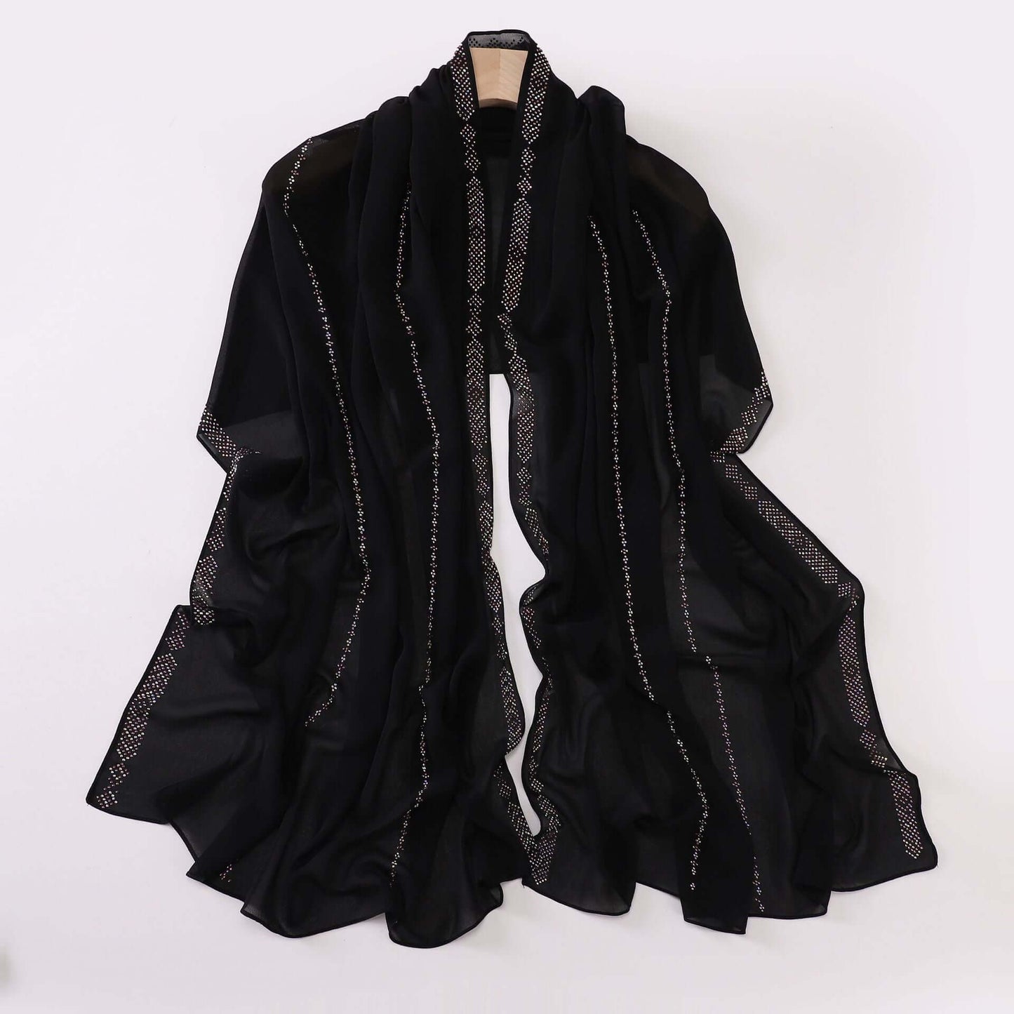 Elegant black chiffon scarf for ladies, versatile accessory for styling, made of soft high-quality material, 175x70 cm.