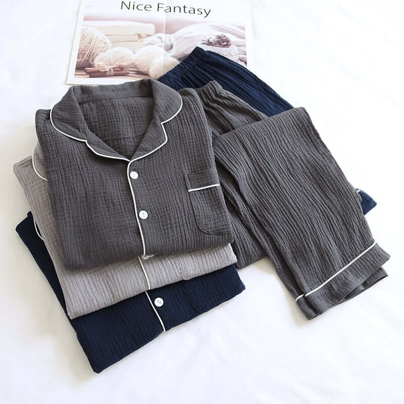 Elegant male pajama set in soft double-layer gauze fabric, ideal for spring and autumn. Features button-up top and comfortable pants.