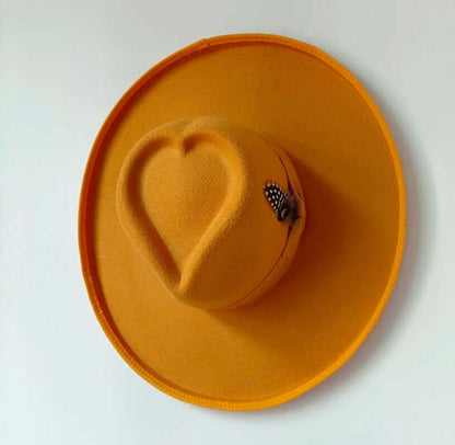 Heart Hat in vibrant orange with woolen fabric, featuring a unique heart shape and elegant design, ideal for warmth and style.