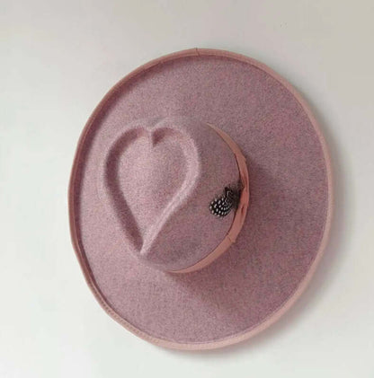 Heart Hat made of woolen fabric, featuring a unique heart design, ideal for warmth and style; medium size in a soft pink shade.