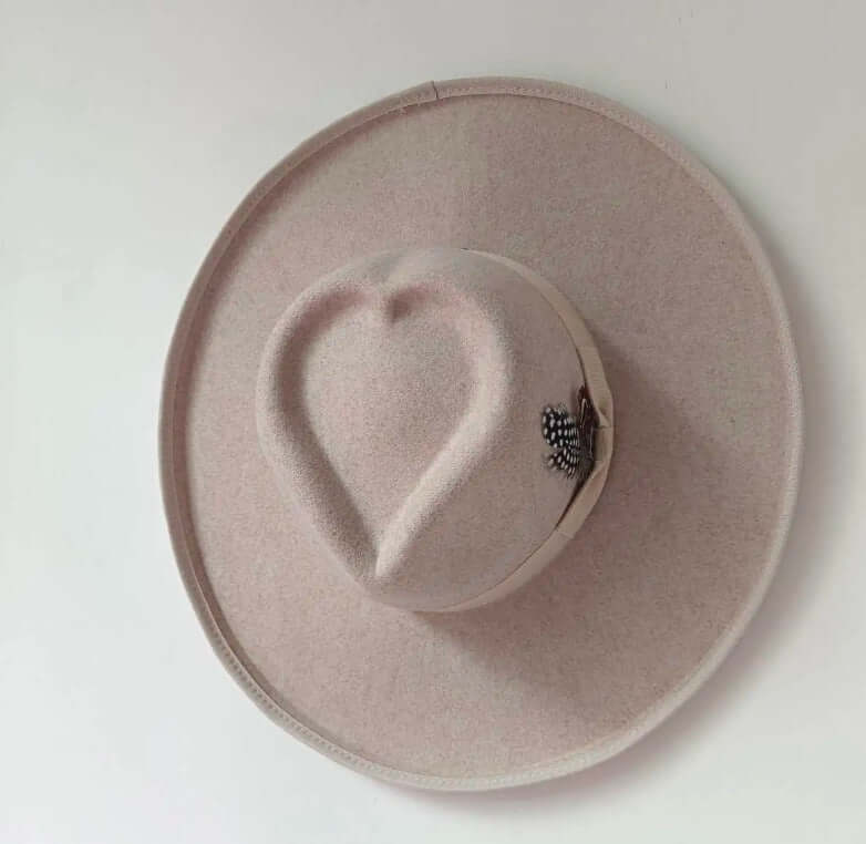 Heart Hat made of woolen fabric with a satin finish, featuring a unique heart design, ideal for warmth and style in medium size.