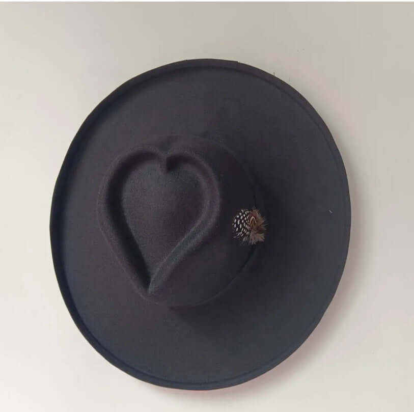 Heart Hat with a unique heart-shaped crown, made of woolen material for warmth, in a classic black hue, ideal for chilly weather.