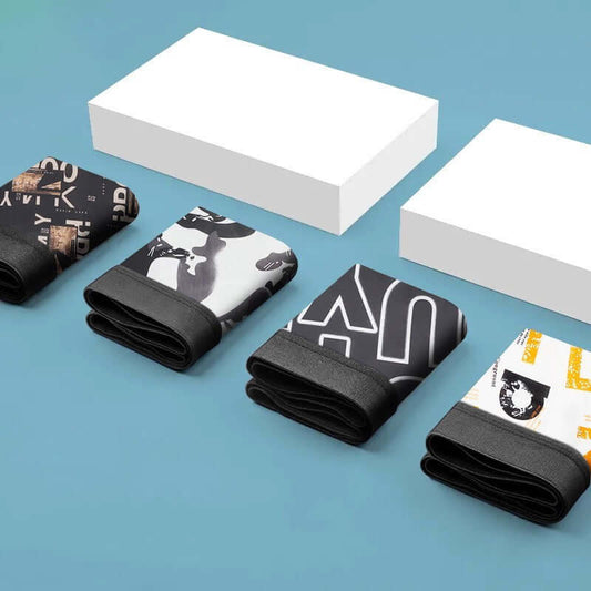 Ice Silk Underwear Pack - Set of 4 printed shorts made from breathable ice silk fabric, displayed with packaging boxes.
