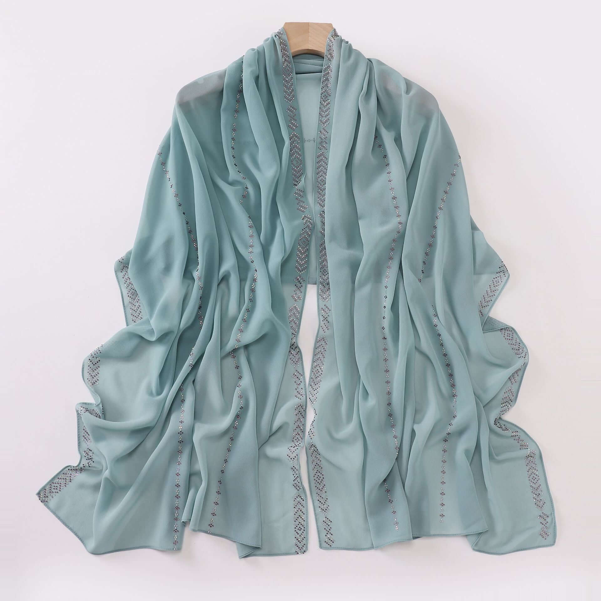 Ladies Chiffon Scarf in soft fabric, perfect for versatile styling. Elegant design for a chic look. Available in multiple colors.