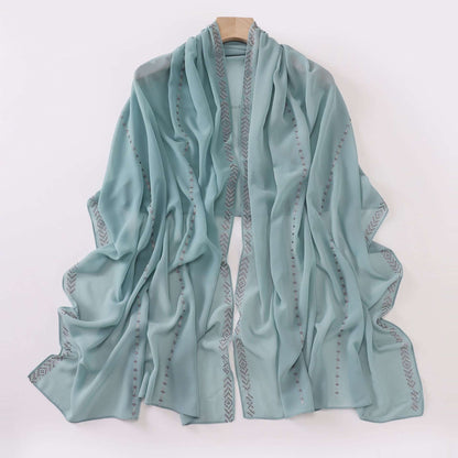 Ladies Chiffon Scarf in soft fabric, perfect for versatile styling. Elegant design for a chic look. Available in multiple colors.