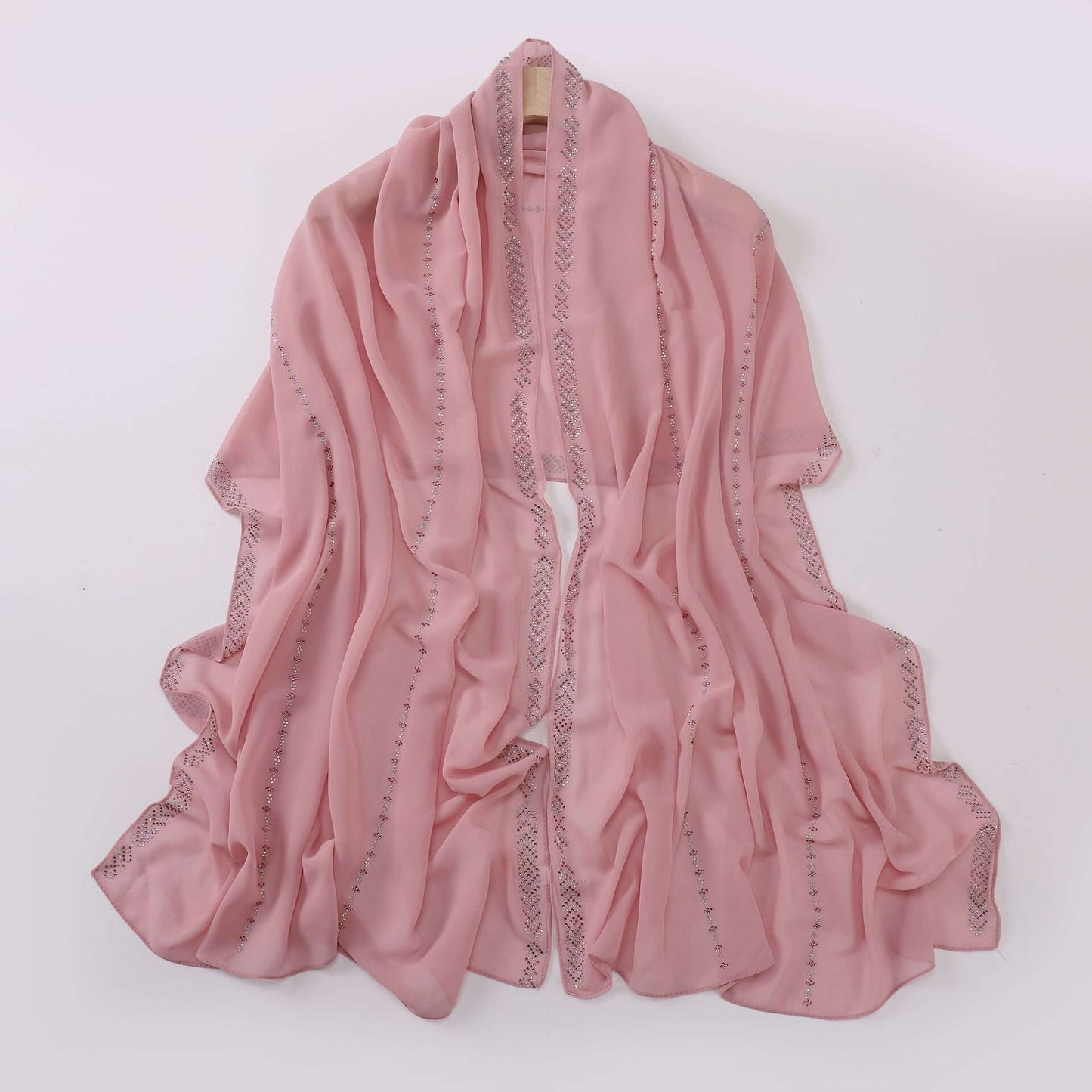 Ladies Chiffon Scarf in soft pink, 175x70 cm, elegant and airy fabric, versatile styling, perfect fashion accessory for any occasion.