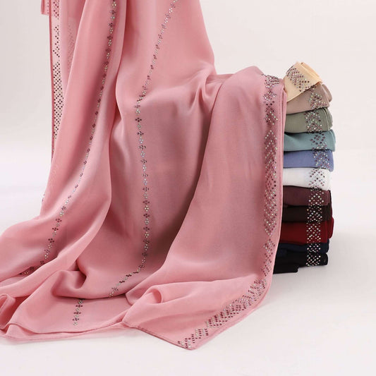 Ladies Chiffon Scarf in various colors, featuring a soft, airy design perfect for versatile styling, displayed elegantly.