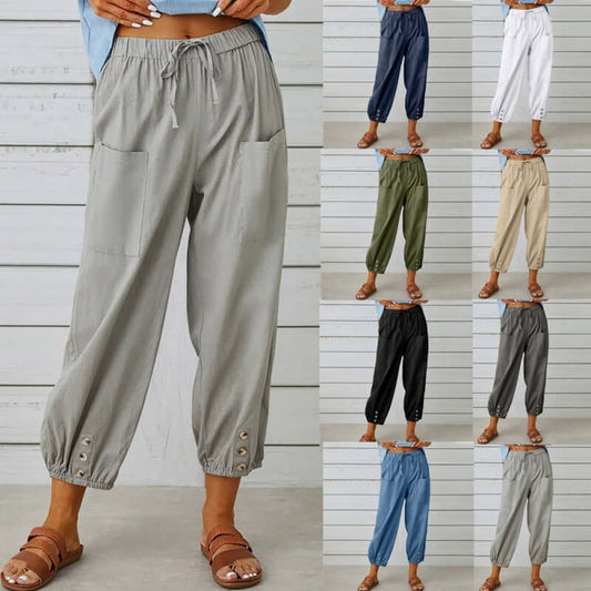 Ladies Linen Trousers available in multiple colors, featuring a comfortable drawstring waist and buttoned cuffs for versatile style.