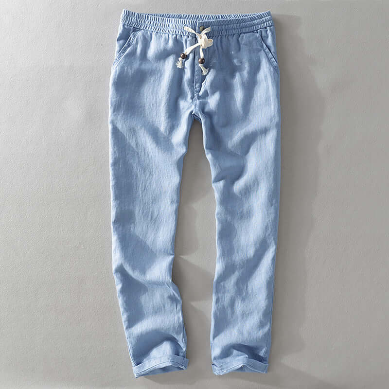 Light blue soft linen trousers for men, featuring drawstring waist, perfect for summer comfort and style in various casual settings.