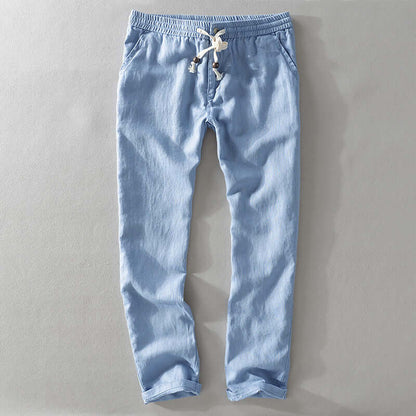 Light blue soft linen trousers for men, featuring drawstring waist, perfect for summer comfort and style in various casual settings.