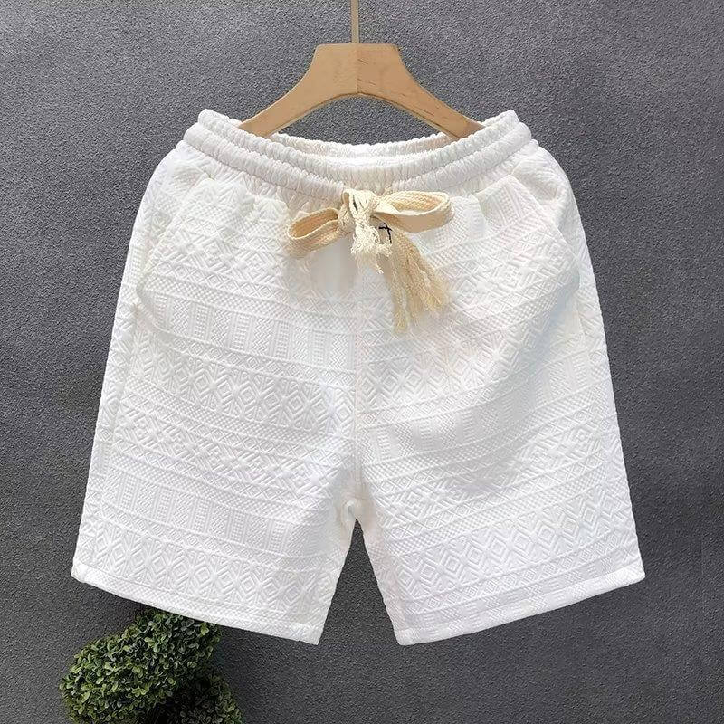 Luxurious white high-end shorts with intricate patterns, offering ultimate comfort and sophistication for men's wardrobe upgrade.