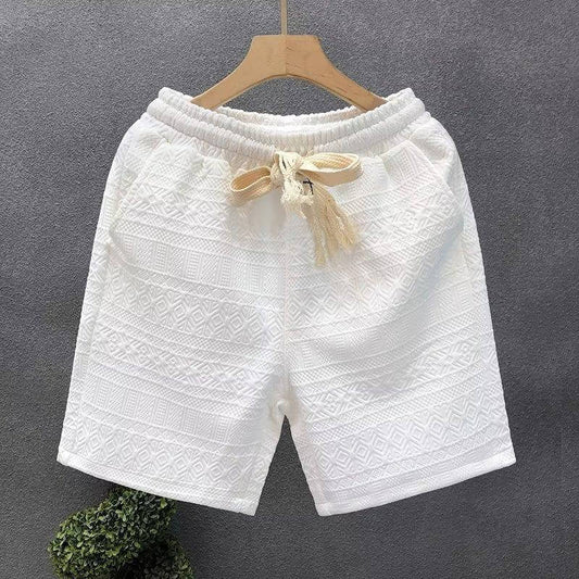 Luxurious white high-end shorts with intricate patterns, offering ultimate comfort and sophistication for men's wardrobe upgrade.