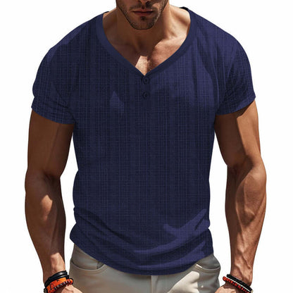 Man wearing a navy V Neck Loose T-Shirt, showcasing casual style and comfort, perfect for versatile wardrobe options.