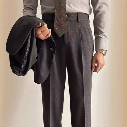 Man wearing stylish suit slacks with a jacket and tie, perfect for formal events or office wear. Elevate your wardrobe with these slacks.