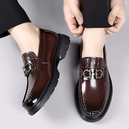 Men's brown patent leather loafers with a stylish, low-top design for easy slip-on, perfect for a discerning gentleman. Available in black too.