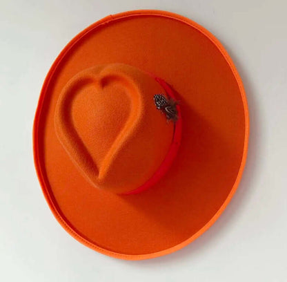 Orange Heart Hat in woolen fabric, medium size, featuring unique heart shape with cozy design, perfect for warmth and style.
