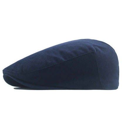 Peaky Blinder Cap in classic navy blue, showcasing elegant and timeless flat cap style for a sophisticated look.