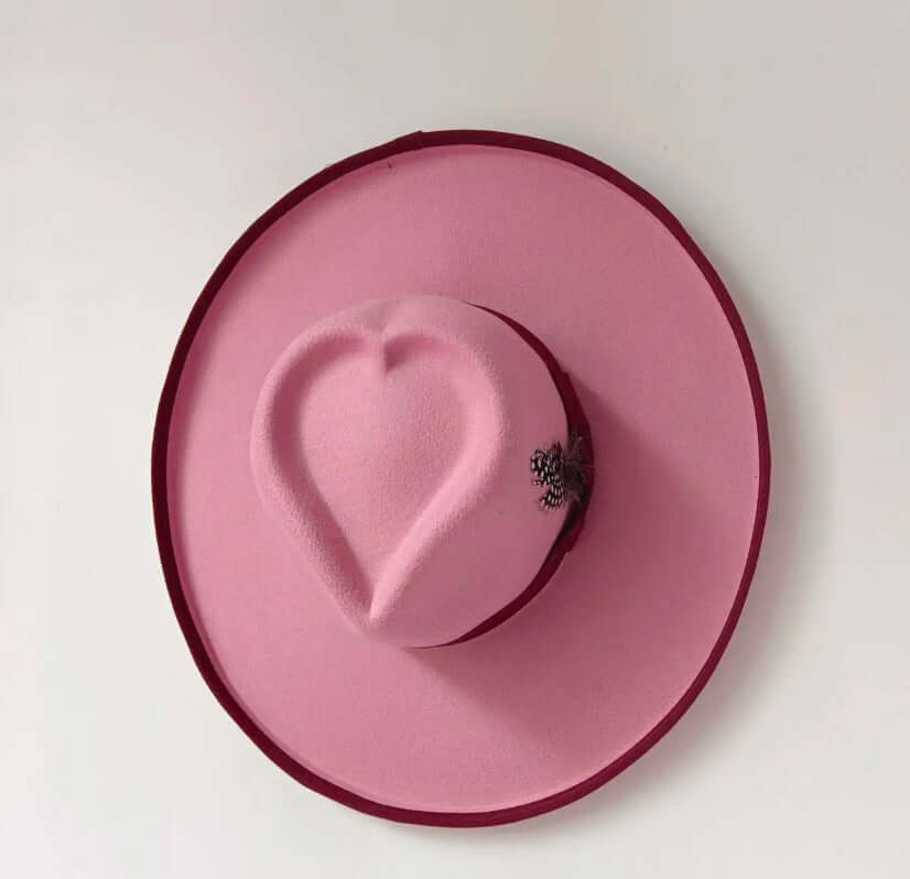 Pink Heart Hat with woolen fabric and warp knitting design, featuring a heart shape and flower embellishment, ideal for chilly weather.