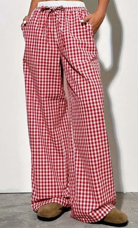 Red checkered wide-leg trousers for women with adjustable drawstring waist, stylish and comfortable for casual wear.
