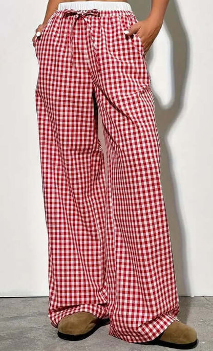 Red checkered wide-leg trousers for women with adjustable drawstring waist, stylish and comfortable for casual wear.