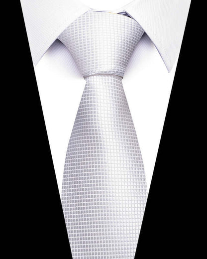 Sleek silver Business Professional Tie on white shirt, perfect for enhancing professional attire at meetings or events.