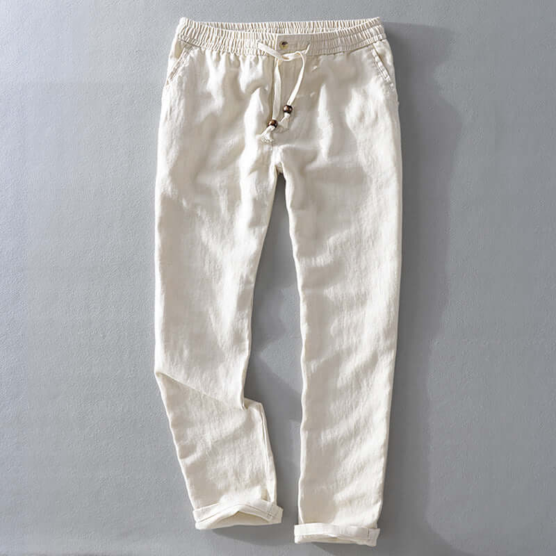 Soft Linen Trousers in beige color, showcasing comfort and style for semi-formal occasions, ideal for warm weather fashion.