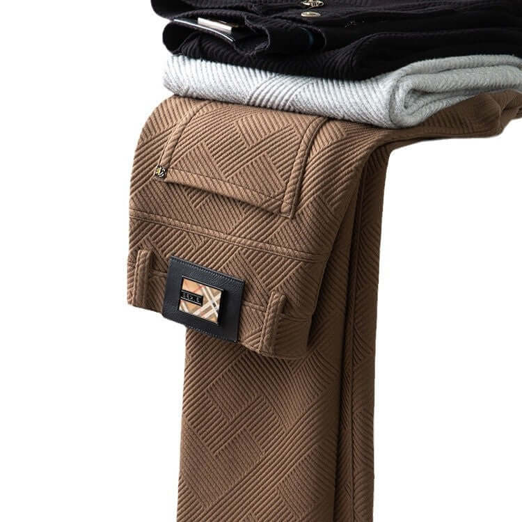 Stack of stylish Jacquard Trousers in various colors, showcasing textured fabric and trendy design for modern men's fashion.