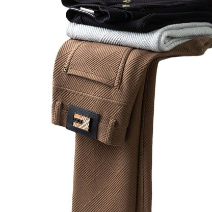 Stack of stylish Jacquard Trousers in various colors, showcasing textured fabric and trendy design for modern men's fashion.