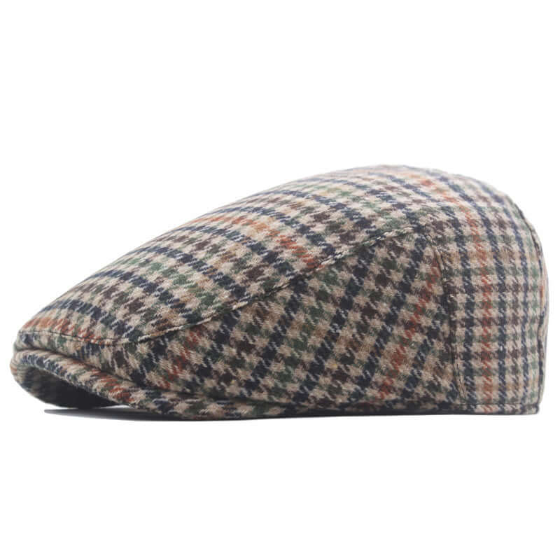 Stylish Peaky Blinder Cap with classic hounds tooth pattern, perfect for adding timeless elegance to any outfit.