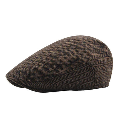 Stylish Peaky Blinder Cap with herringbone pattern, perfect for adding a touch of vintage elegance to any outfit. Ideal for fashion enthusiasts.