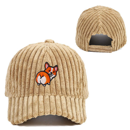 Stylish beige corduroy hat with embroidered dog, perfect for casual comfort and warmth.