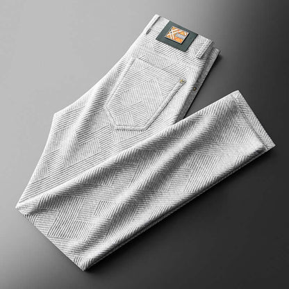 Stylish gray jacquard trousers with geometric pattern for modern men, combining trendy comfort and versatile style.